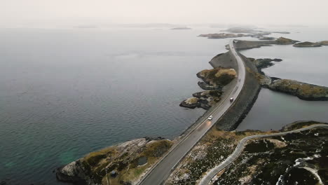 aerial view of atlantic ocean road on a foggy day in norway