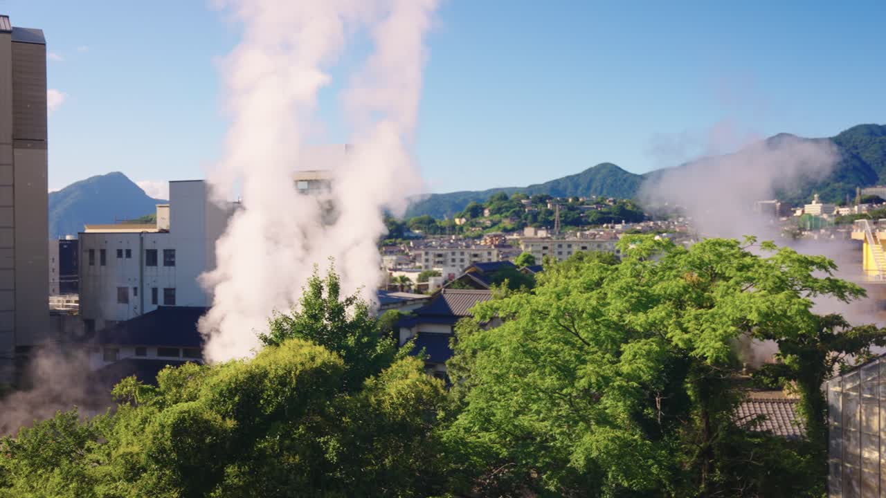 Beppu City, Onsen and Geothermal Steam Rising Over Landscape, Sunny Day, Japan