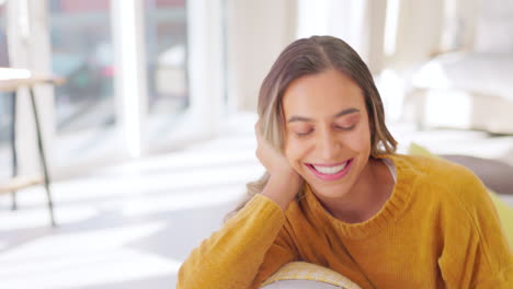 Face,-smile-and-woman-relax-in-living-room