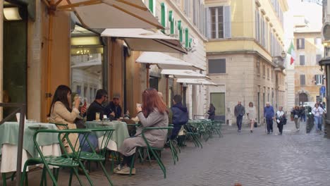 people dining outside a cafe