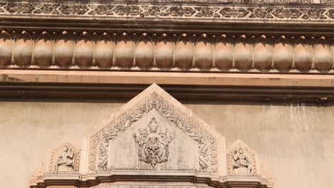 detailed carved facade on the patuxai victory monument in the center of vientiane, laos