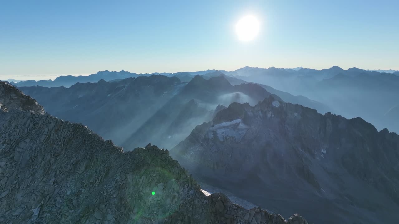 Aerial footage of a small glacier field and a surrounding mountain ridge in the mountains of South Tyrol - Italy.