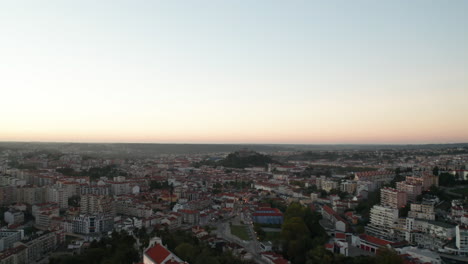 sanctuary of nossa senhora da encarnacao with panoramic cityscape at the background in leiria, portugal