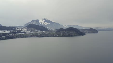 drone aerial of the lake thun thunersee in winter