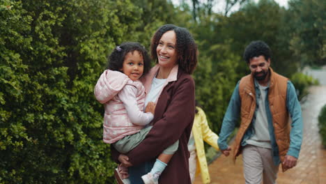 happy family walking in the park