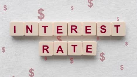 interest rate words spelled out on scrabble tiles with red dollar signs going up