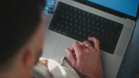 Man Making An Online Credit Card Payment