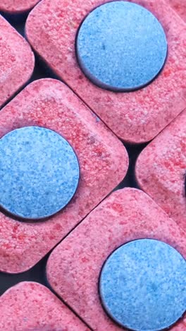 macro video background with dishwasher capsules dishwashing concept