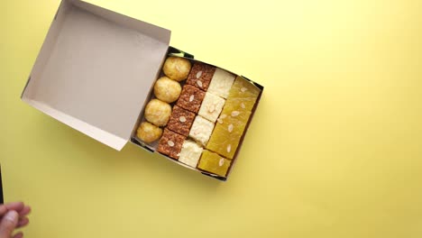 assortment of indian sweets in a box