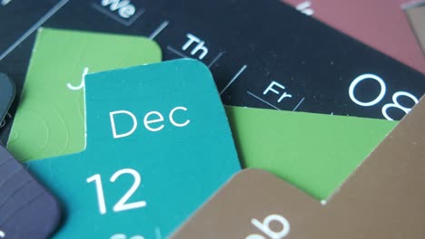 close up of a calendar with december 12th circled