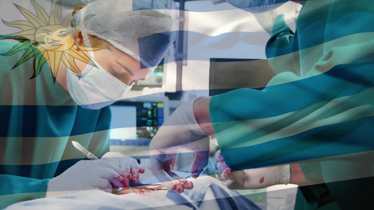 animación de la bandera de uruguay ondeando sobre los cirujanos en la sala de operaciones