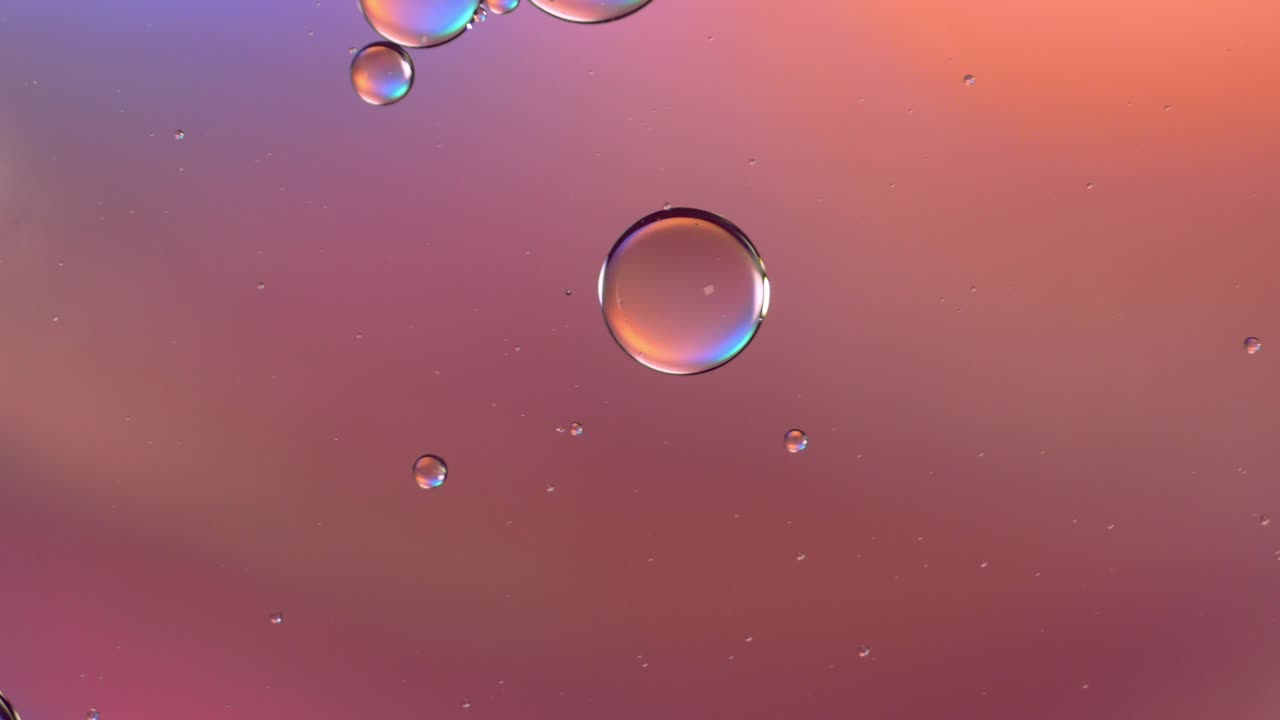 Colorful artistic of oil drop floating on the water. Abstract bubble background