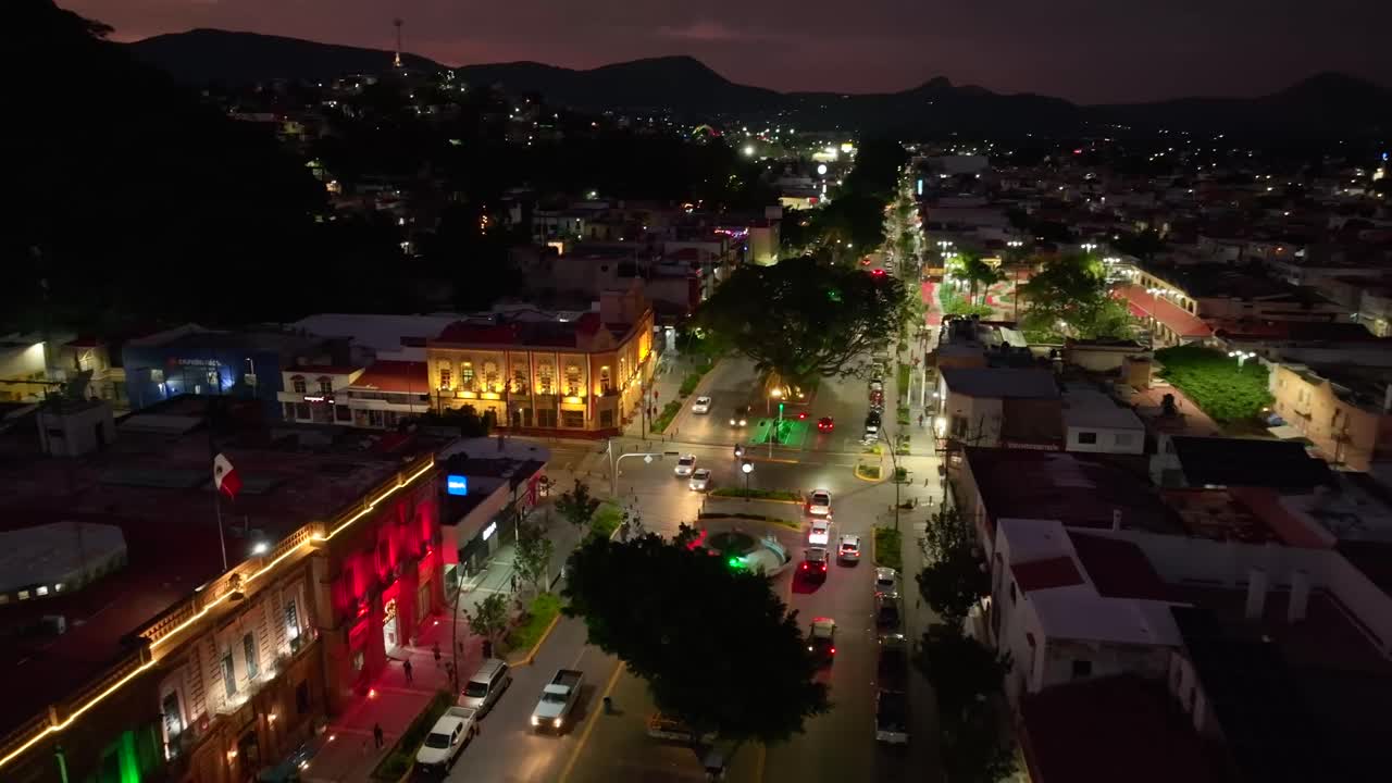 Aerial View of a Mexican City Street at Night