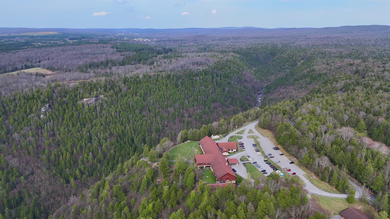 Aerial View of Lodge and Parking Lot Surrounded by Lush Forest in Blackwater Fall State Park
