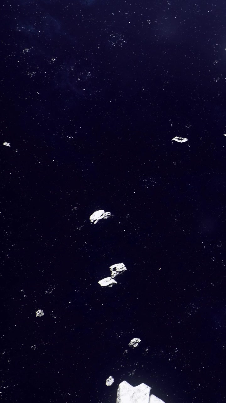 Asteroids float in space against a dark background filled with stars