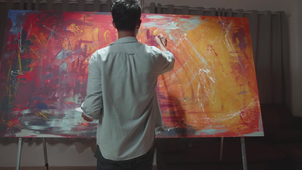 Talented Male Artist Energetically Draws With Paint Brush, He Creates Modern Masterpiece Of The Oil Painting