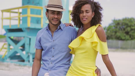 cheerful couple looking at camera