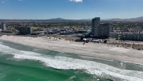 coastal cityscape with beach and buildings