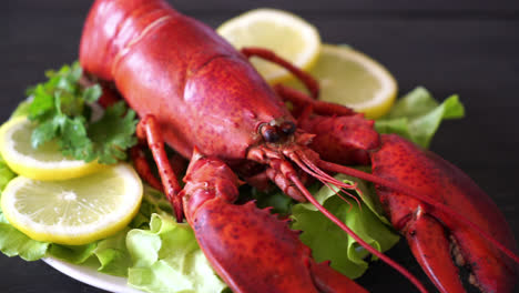 freshly boiled lobster with vegetable and lemon