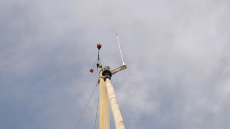 Slow-motion-shot-of-weather-vane-on-a-boat-spinning-and-giving-information