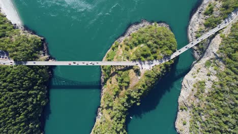 Still-top-down-birds-eye-view-drone-shot-of-deception-pass-bridges-in-anacortes-washington-WA-USA-on-a-sunny-spring-day