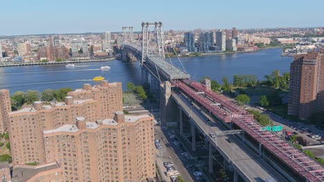 aerial of the williamsburg bridge connecting new york city and brooklyn over the east river