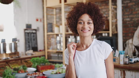 Portrait-Of-Woman-Shopping-In-Sustainable-Plastic-Free-Grocery-Store