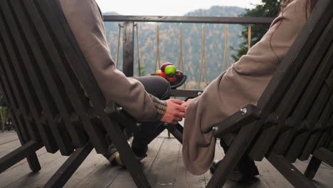 couple relaxing on a mountain patio