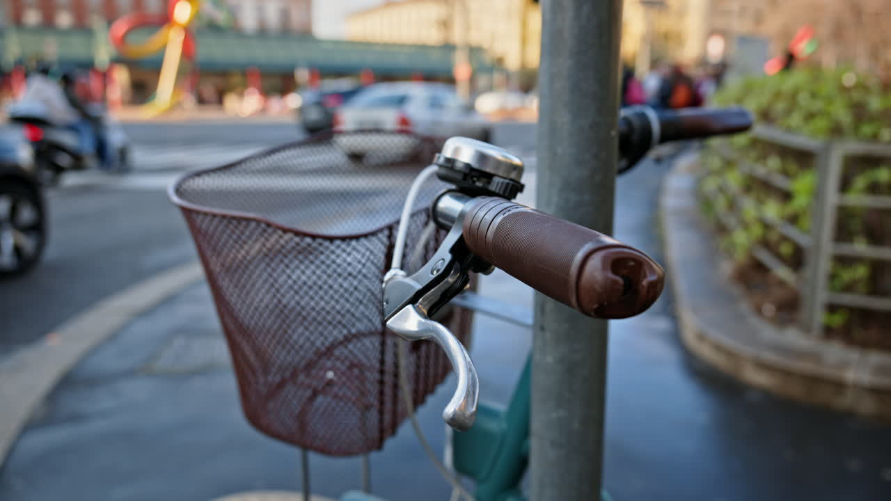 Close up of a brown and green bike parked on the street with a blurred background