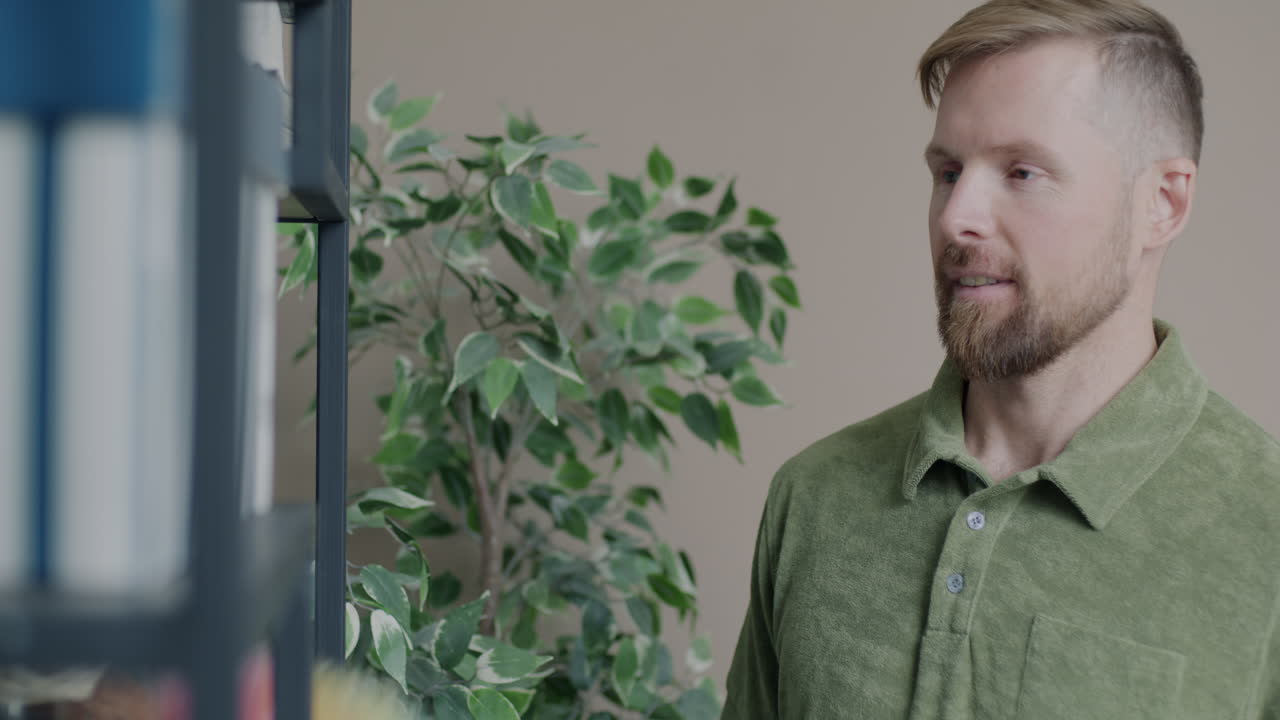 Man Cleaning Shelves