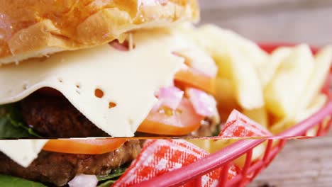 hamburger and french fries in basket