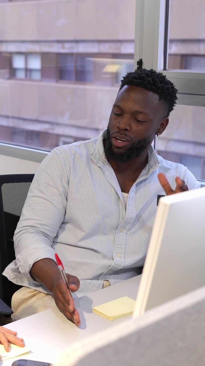 Man sitting at a desk in an office