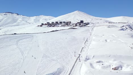 Establishing-shot-of-El-Colorado-Ski-Resort-with-people-going-down-the-slopes