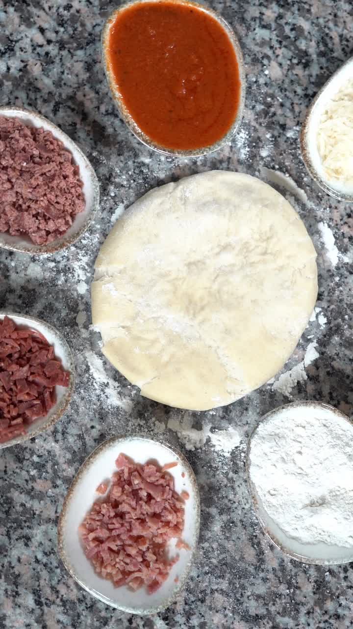 A view of dough for Italian pizza, close up shot, high angle shot