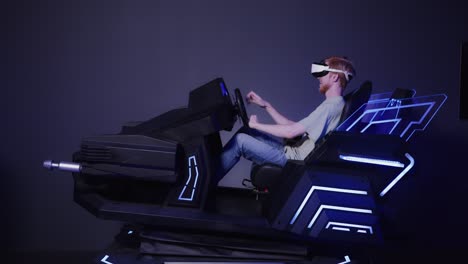 person using vr racing simulator