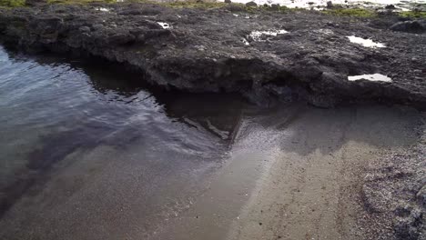a little peaceful beach with rocks