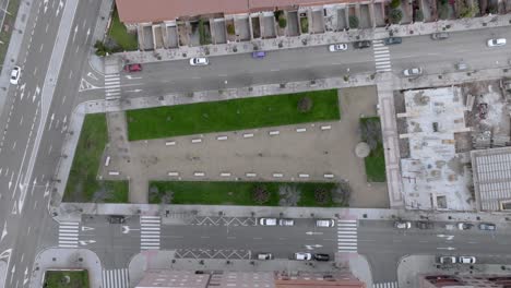 bird s eye shot of street in modern residential area decorated with green spaces