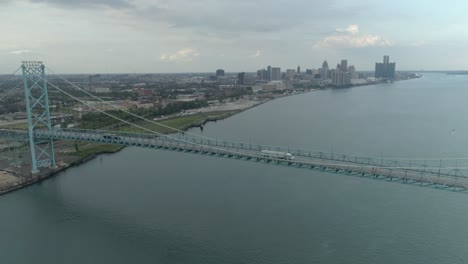 this video is about an aerial of the ambassador bridge over the detroit river near downtown detroit