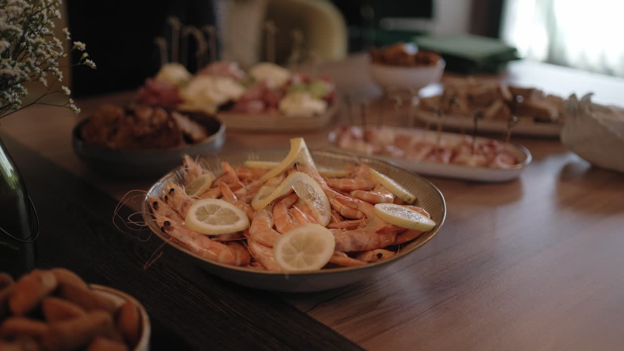 fresh shrimp garnished with lemon slices on wooden table in cozy ambient light