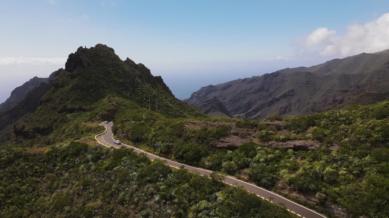 Drone shot beautiful mountains of Tenerife with street and car