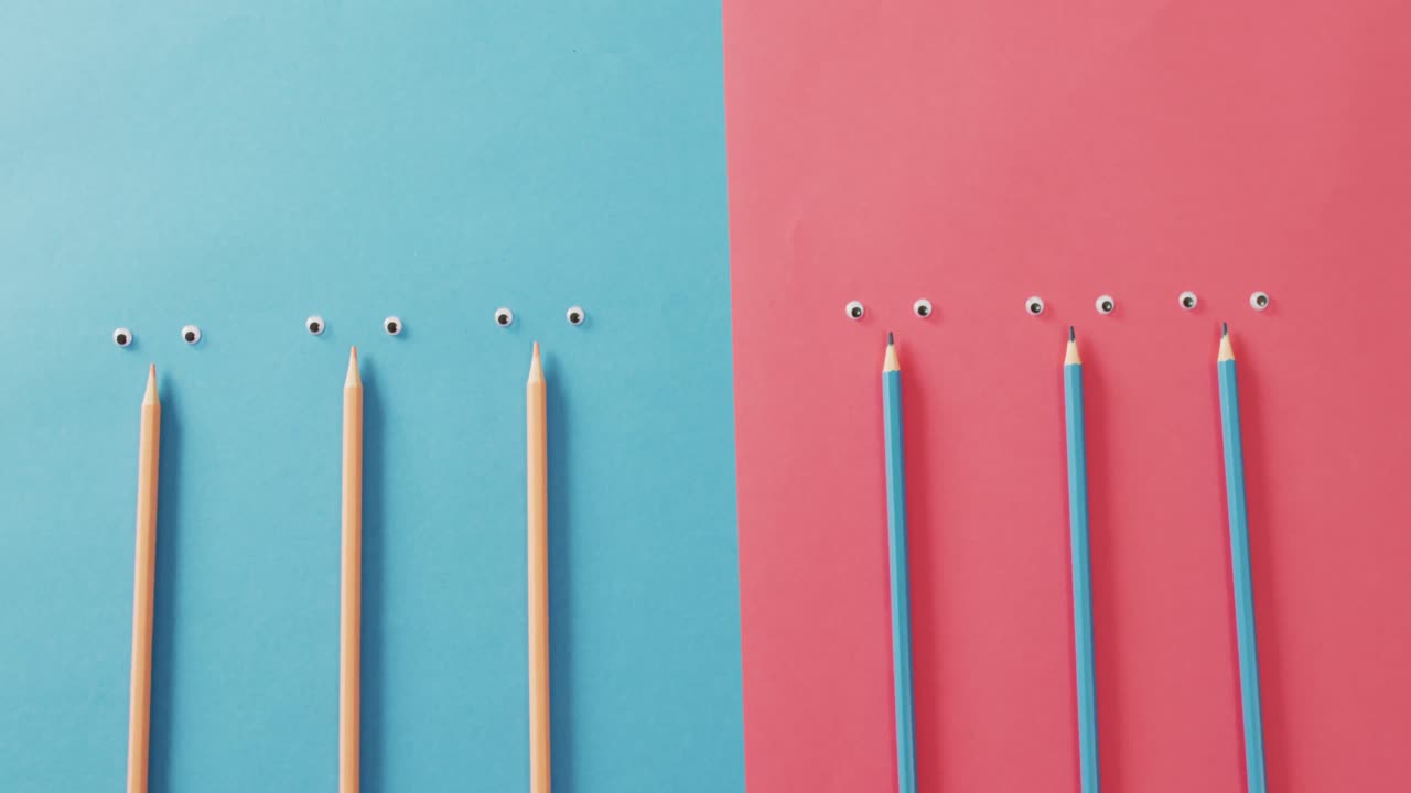 파란색과 분홍색 표면에 크레이온과 눈으로 구성 된 비디오