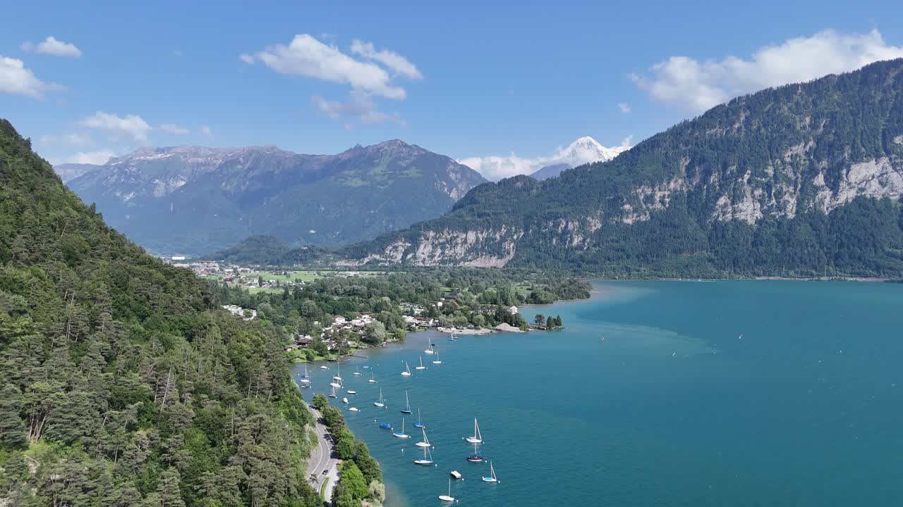 Lake Thun turquoise water Interlaken Jungfrau region Switzerland ascending drone,aerial