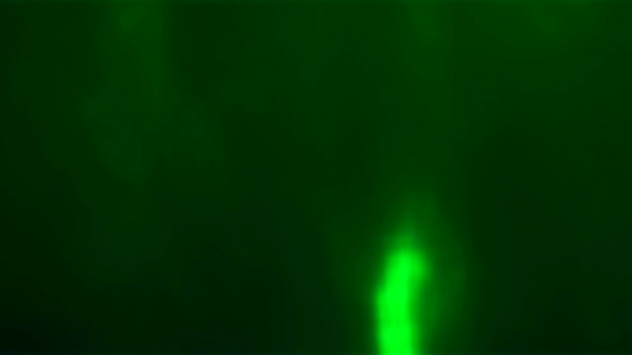 fondo abstracto con manchas de luz multicolores en movimiento.