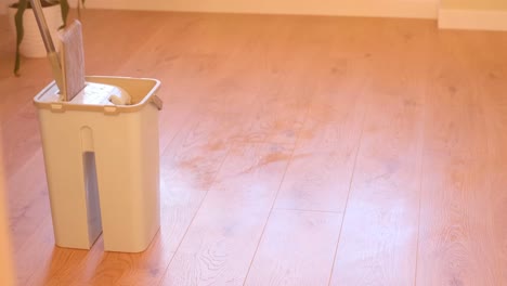 wet cleaning with a hand mop - young man carefully cleaning face of shiba inu dog with wet wipe, demonstrating gentle care, hygiene, strong bond between pet owner and loyal companion. man cleaning shiba inu dog face with wet wipes