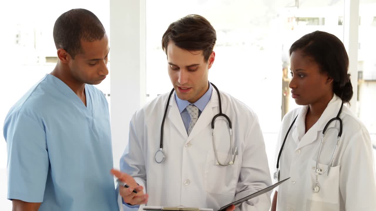 Happy medical team speaking