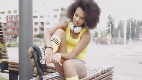 sporty woman wearing rollers