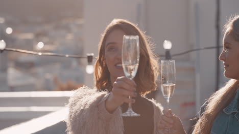 happy-group-of-friends-making-toast-drinking-champagne-celebrating-rooftop-party-enjoying-diverse-reunion-celebration-on-weekend-social-gathering-at-sunset-slow-motion