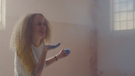 fashionable young woman in an abandoned warehouse