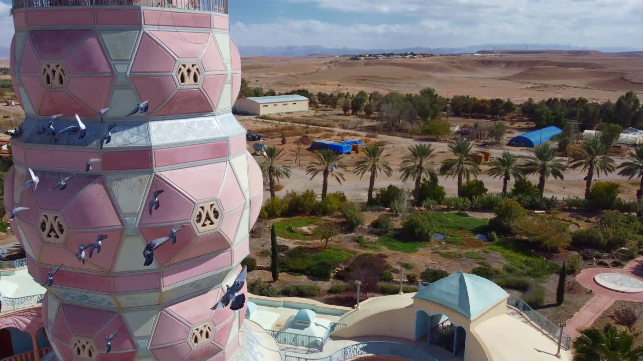Aerial closeup of architectural details of Neot Smadar Arts Center cooling tower with Arava desert in the background