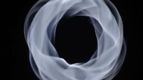 a mesmerizing journey through ethereal swirls: exploring the transformation from vivid light patterns to the enigmatic darkness beyond